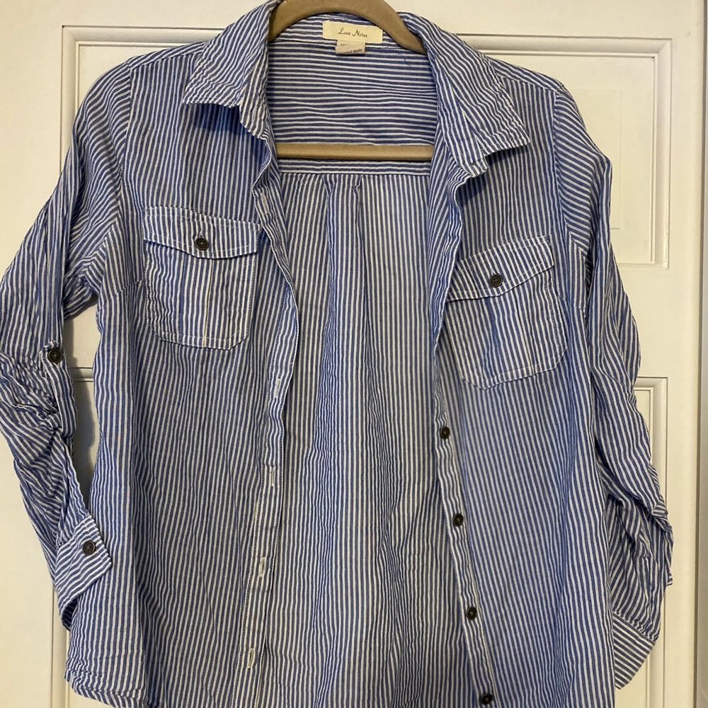 Collared blue and white striped shirt